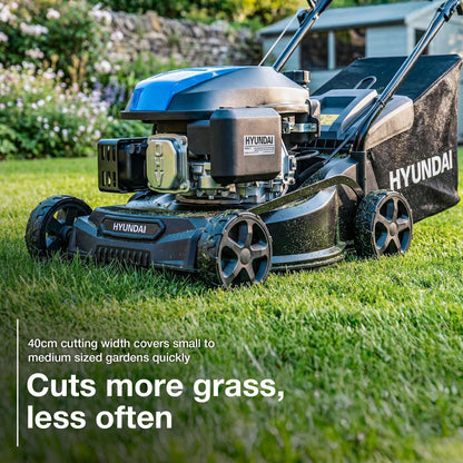 Hyundai HYM16130PX petrol lawnmower side view with grass bag